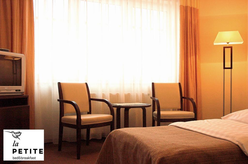 La Petite Apartments & Rooms Гданск Стая снимка